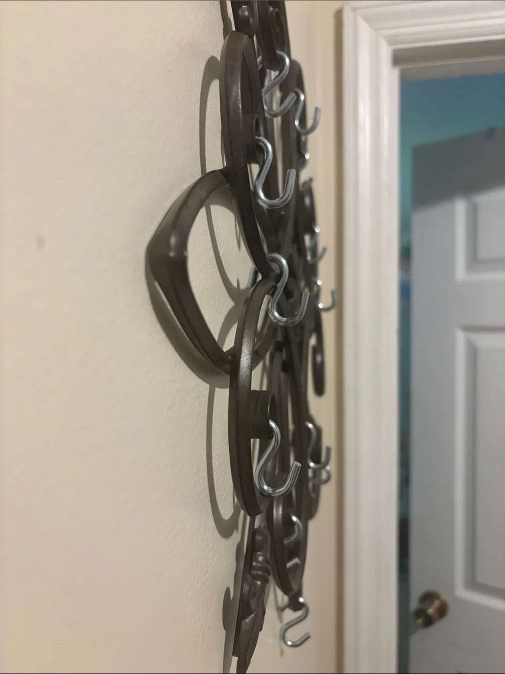 Decorative metal wall hanging jewelry holder